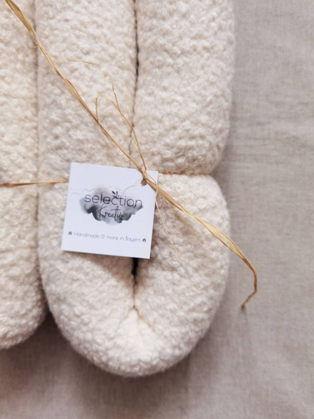 Minischlange Boucle Ecru von Selectionkreativ - dem Babyladen in Deggendorf